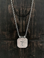 The cedar tree has long been associated with strength and longevity. It's the heart of the  that we etched here on our 925 sterling silver pendant.