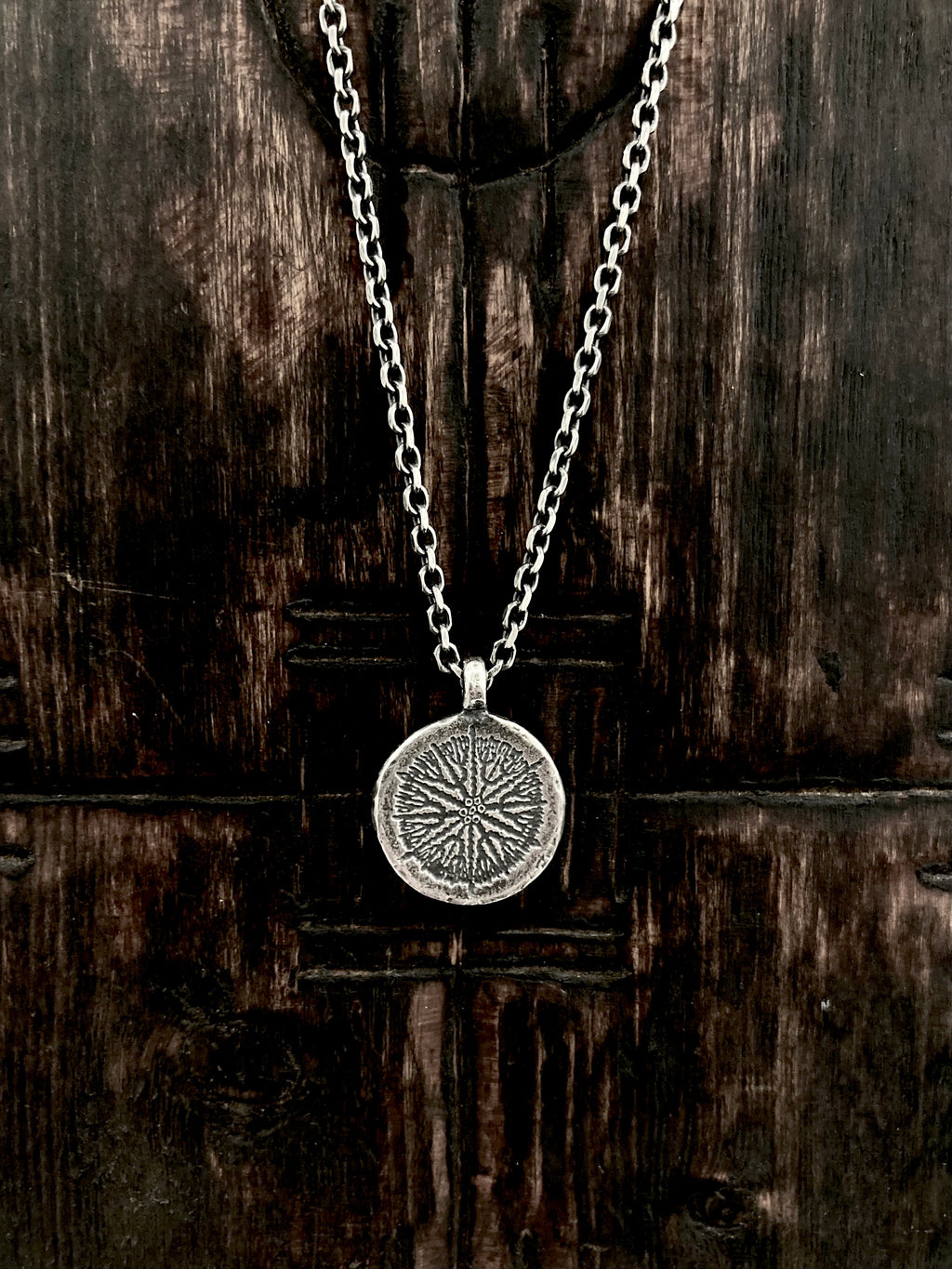 Our handcrafted 925 solid sterling silver etched Coral Compass circle pendant necklace.  The pattern reminds us of old nautical compasses. 