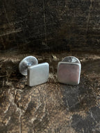 A pair of hand cast 925 sterling silver cufflinks with a natural finish. Bespoke mens jewelry