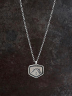 Sterling silver necklace with an etched sacred owl
