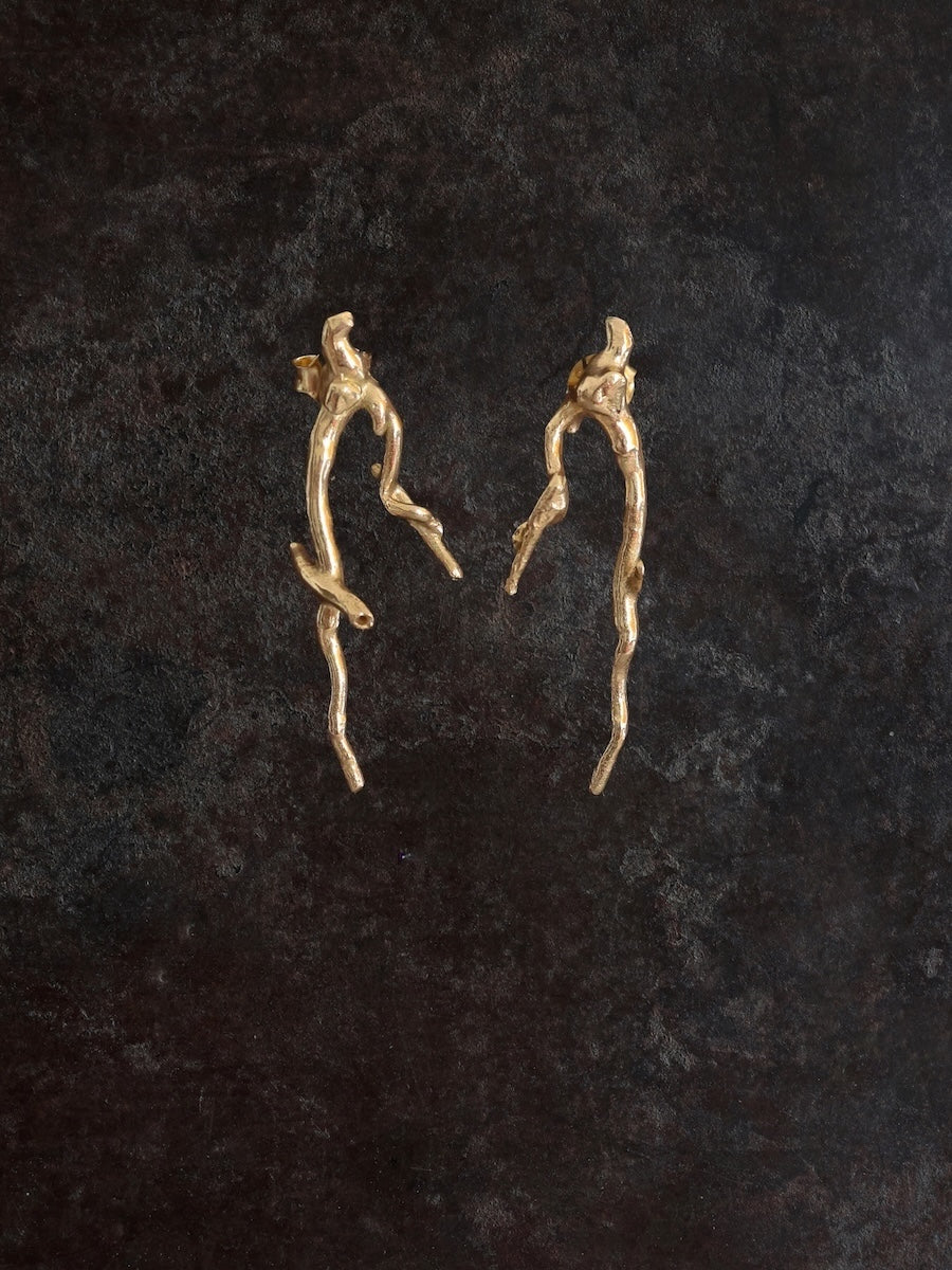 Pair of gold twig shaped earrings in 14k gold