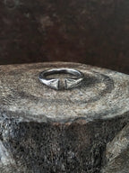 Two rings, one with a gold triangular split front and the other with a silver triangular split front, both set with two trillion diamonds and surrounded by hand beading Mens Jewelry Womens Jewelry