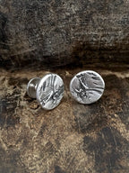A pair of 925 silver cufflinks with a design depicting bark texture from a redwood tree