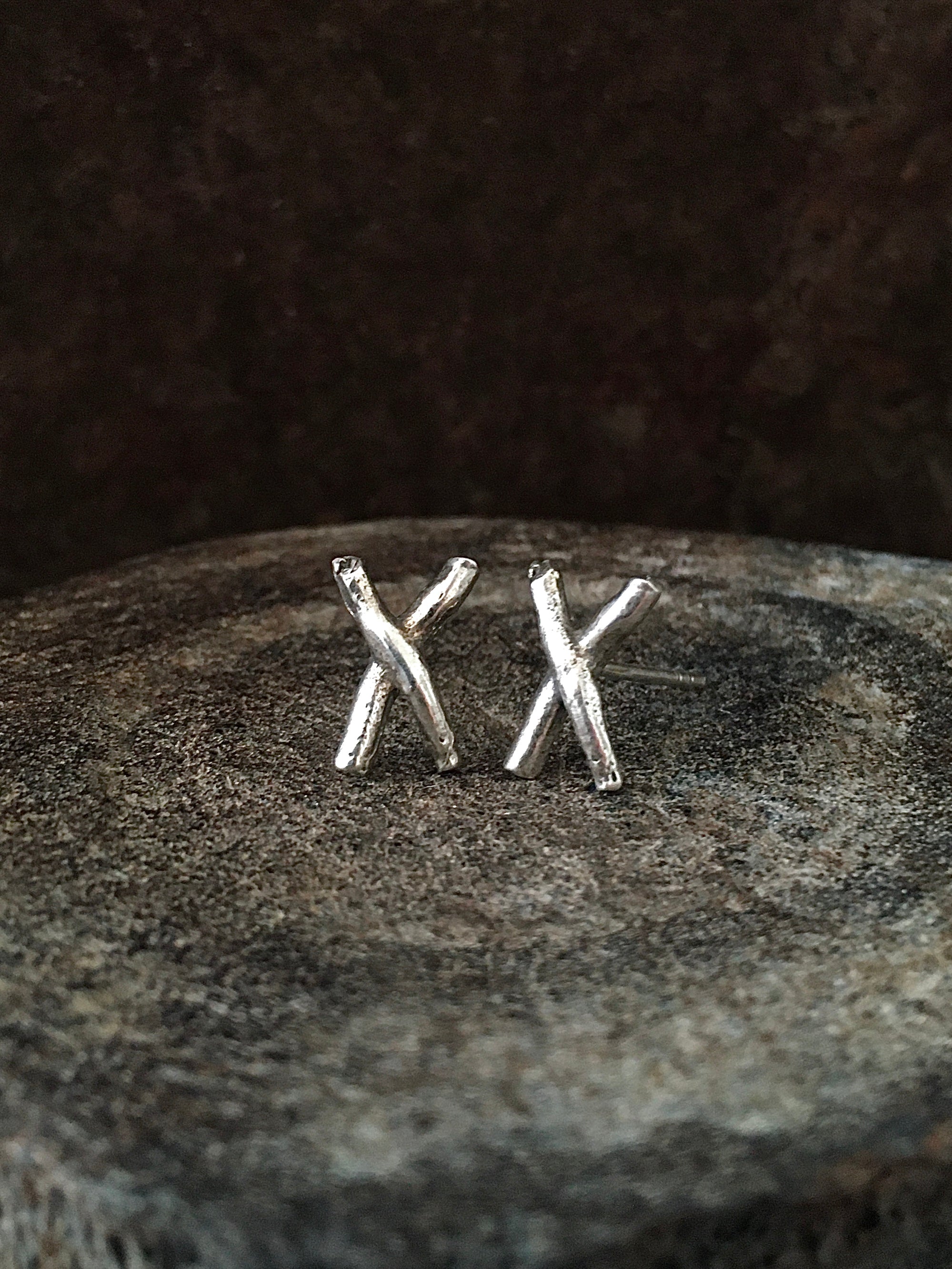 A pair of Sterling Silver stud earrings with an organic X shape Mens Jewelry Womens Jewelry